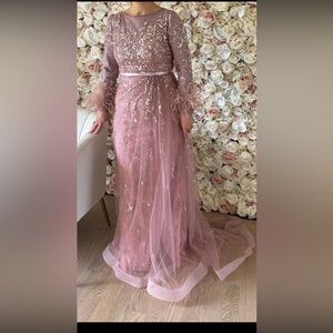 Elegant Pink Sequin Gown with Feather Details